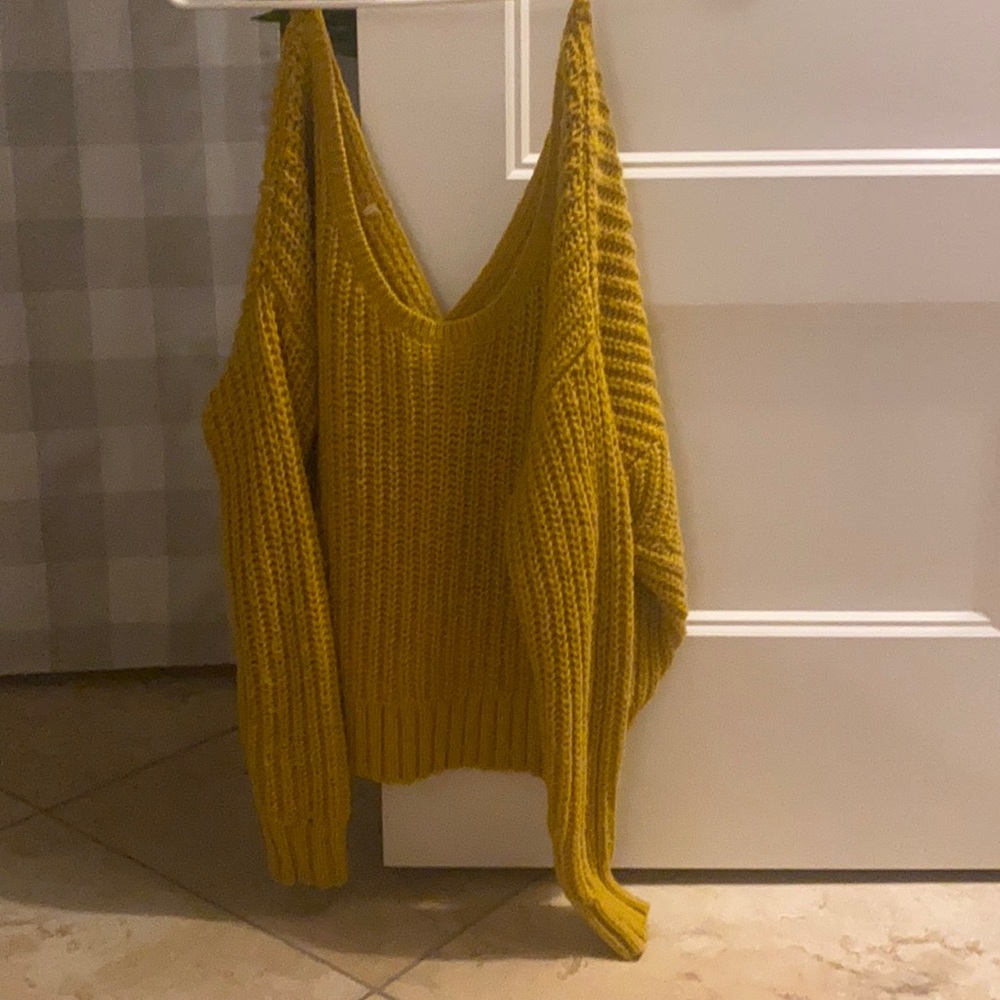 Yellow sweater with cut out shoulder